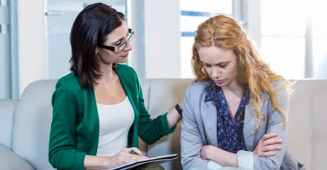 psychologist-comforting-depressed-patient 3